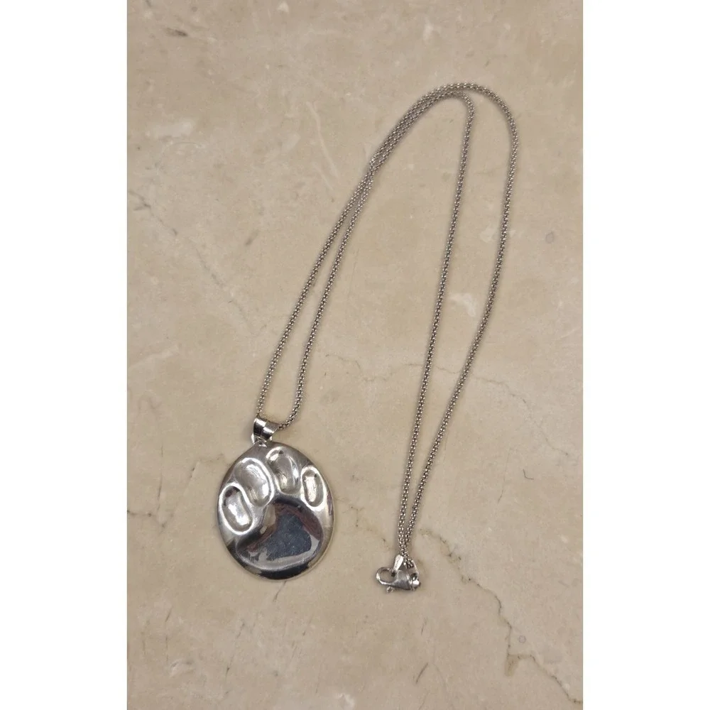 Vintage Sterling Silver Embossed Paw Print Pendant 17